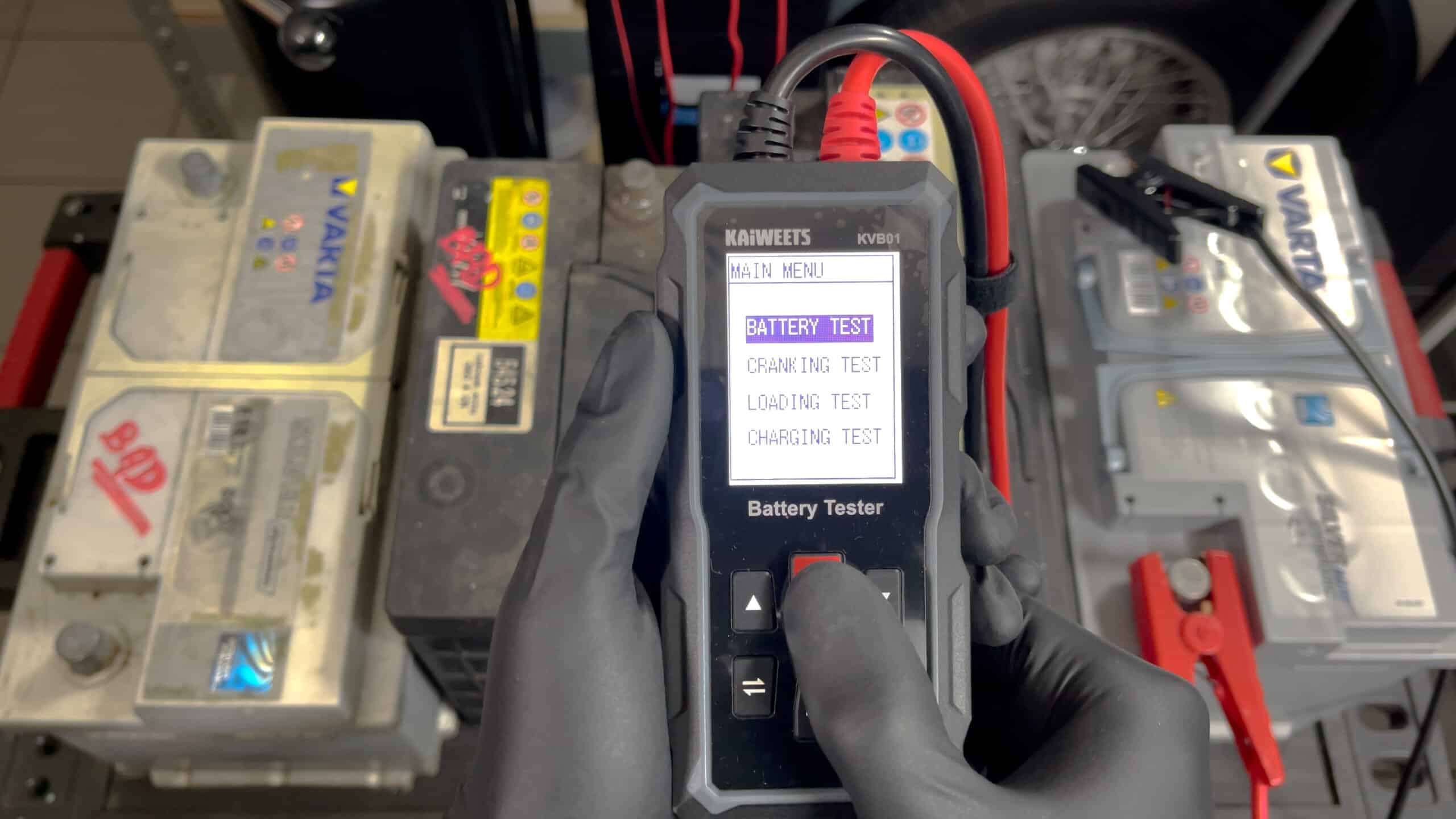 The reviewer showing the test options in the battery tester menu